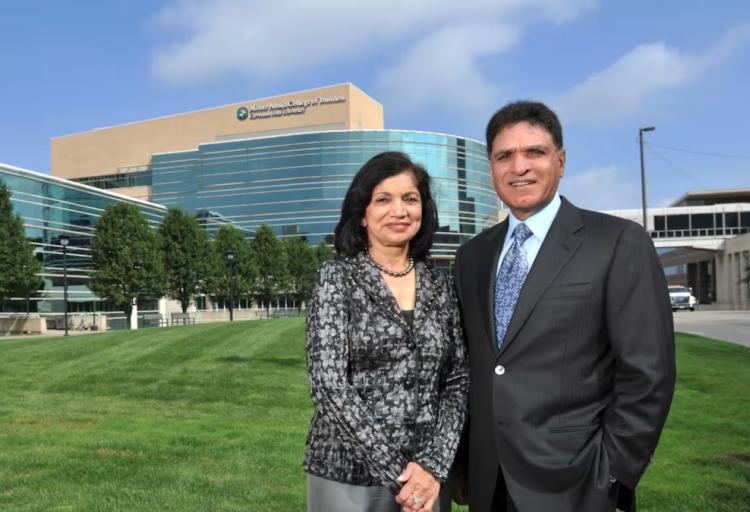 Usha, left, and Monte Ahuja