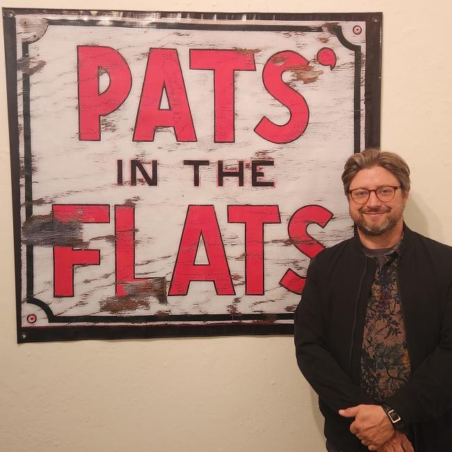 Shawn Mishak on the opening night of the exhibition.