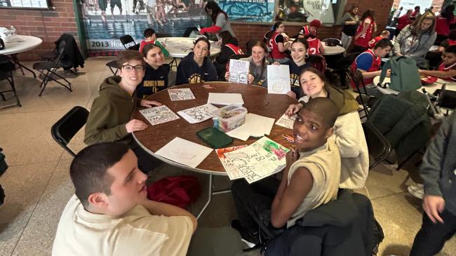 Olmsted Falls High School volunteers engaging with students during arts and crafts. (credit: Aria Ruiz) 