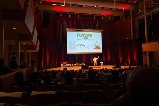 Camilo A. Ferro, RAWS Tech president, explains the mission of returning to water, air and soil at TEDx Cleveland State University on October 23, 2026. (Credit: Aria Ruiz)