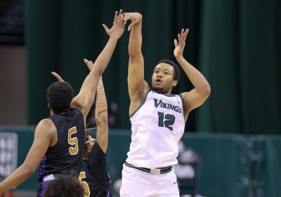 Cleveland State’s Algevon Eichelberger shoots a three-pointer during a Horizon League quarterfinal against Purdue Fort Wayne on Mar. 2.