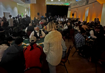 students play casino games at various tables around the lower atrium of the Student Center