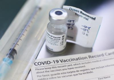 COVID-19 vaccine vaccination card needle