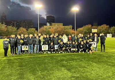 Viking seniors pose with their families after being honored on senior night