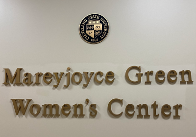 The Mareyjoyce Green Women's Center banner on the wall of Berkman Hall.