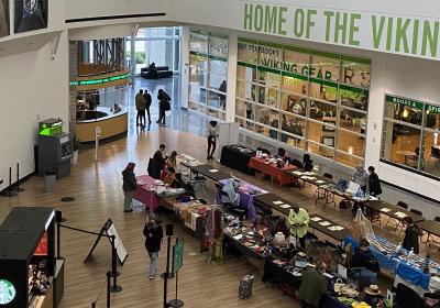 CSU's Student Center filled with tables, people and activites.