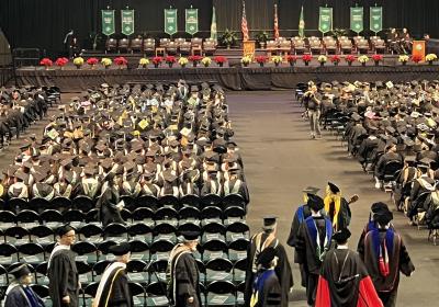 Academic procession enters Wolstein Arena, Dec. 6, 2023 for the CSU fall commencement.