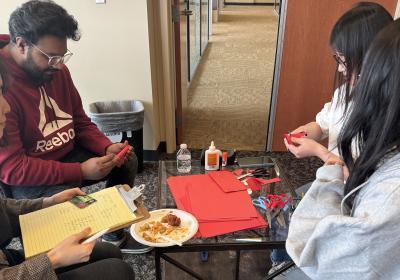 Students attending the Lunar New Year celebration gathered for the red envelope cutting, played games and enjoyed Asian-style foods on Feb.8, 2024.