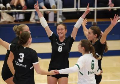 CSU women's volleyball celebrates.