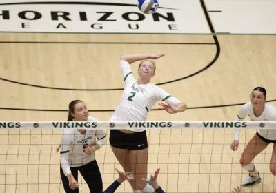 CSU women's volleyball spikes.