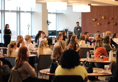 Students from local universities listen as professionals in the public relations field give presentations. 