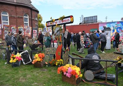 Many of the altars at the festival were created by artists, including a pets' altar where guests could write down the names of pets they have lost or who have been missing for years, Nov. 1, 2025. 