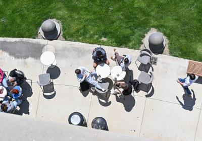 Students sitting around table at Cleveland State University.