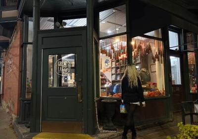 Madilynn Alten looks into the Great Lakes Brewing Company, in Ohio City, Cleveland, Oct. 28, 2025.