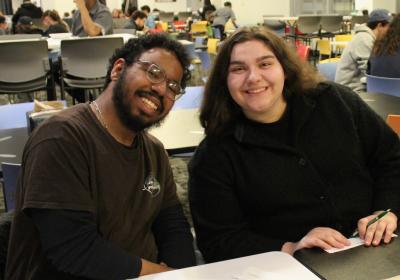 Students Yadiel Mercado, left, and Christina Arrichi pose while playing a round of “pop culture moments” trivia in Viking Marketplace on Thursday, Jan. 29, 2026.