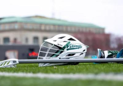 CSU men's lacrosse helmet on a field