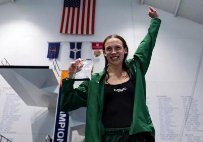  Ellie Seiter holds her 1-meter diving championship award at the Horizon League Championship on Feb. 20, 2026.