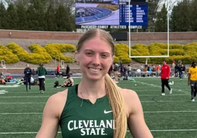 Olivia Todd, Cleveland State track star, proudly posing after setting a school record in 400-meter hurdles at the meet in Lewisburg, Pennsylvania.