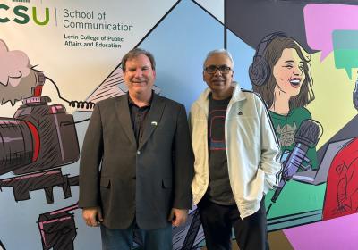 Robert Whitbred, Ph.D. (left) and Anup Kumar, Ph.D. (right) at the Cleveland State University School of Communication, April 16, 2026.
