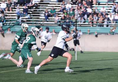 Adam Van Voorhis carries the ball upfield against LIU during Cleveland State’s regular-season finale in Brookville, N.Y. 