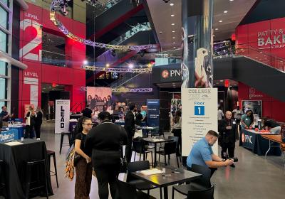 Students speak to employers located on the first floor of the College Fest 2026 at the Cleveland Rock and Roll Hall of Fame.