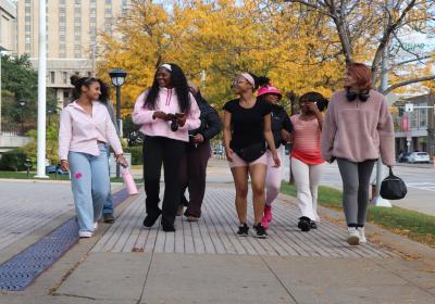 On Oct. 15, 2026, students walked through downtown Cleveland to mark Breast Cancer Awareness Month. Pictured from left to right are: CSU Run Club President Ashlee Mottl, New Era Scholars Treasurer Lakira Harrel, New Era Scholars Community Coordinator Angellise Gray.