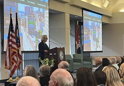 CSU President Laura Bloomberg, Ph.D., speaks to a packed room at the State of the University address, Oct. 14, 2026.