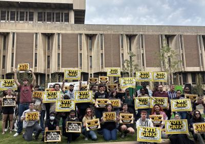 Students pose with Greg Levy at McCombs Family Plaza, Cleveland State University, Oct. 1, 2026.