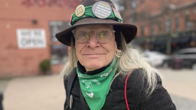 Activist Robert McDonald spent his time handing out informative flyers at the women’s rights rally on Saturday, Jan. 21t, 2023, in Cleveland’s Market Square Park.
