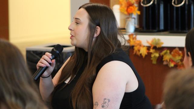 CSU student Jessica Strimpel asks content creator Jala Norman for the Cleveland Guardians a question during Norman's presentation.