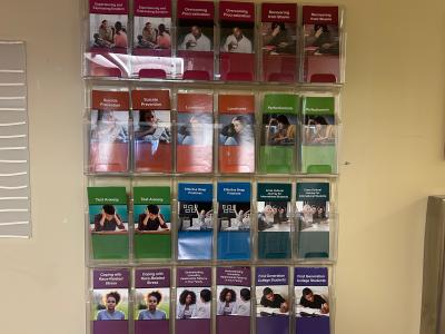 A sign directs visitors to the Cleveland State University Counseling Center inside a campus building. (Credit: Aria Ruiz)