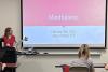 Graduate student Alyssa Kurkul looks at her PowerPoint presentation titled "Mindfulness."